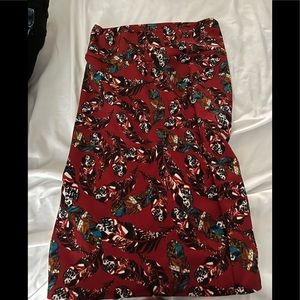 Red pencil skirt with feathers